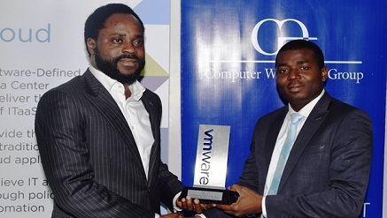 L-R: Mr. Dayo Abegunde, Associate Vice President, Computer Warehouse Group Plc (CWG) receiving the VMware Solution Provider of the Year award from Mr. Emmanuel Adeogun, Nigeria country manager, VMware Incorporation.